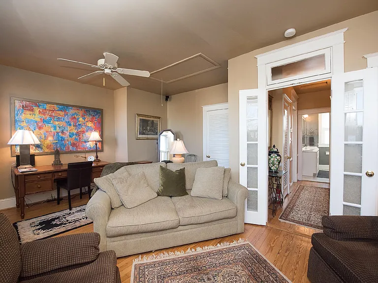 Den also has work-at-home desk/office space.