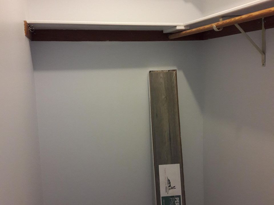 Walk in closet in bedroom