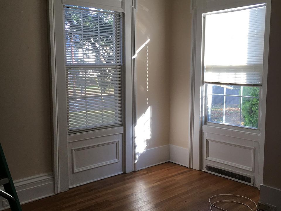 Bright living area with hardwood flooring