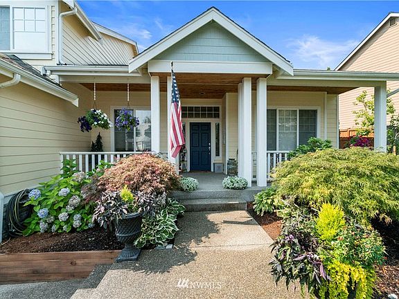 Welcoming covered front patio