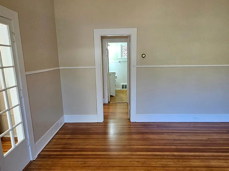 Bright natural light and original wood floors
