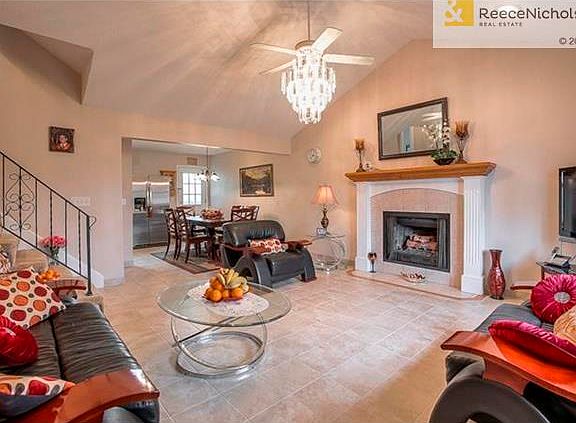 Spacious living room w/tile floor & fireplace