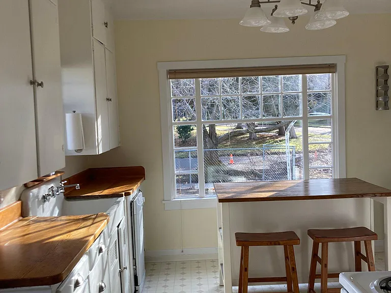 The dining island in the kitchen is a lovely spot to have a cup of coffee and watch the world wake up.