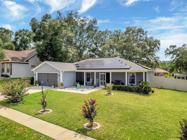 302 STONE CASTLE LOOP, LADY LAKE, FL 32159