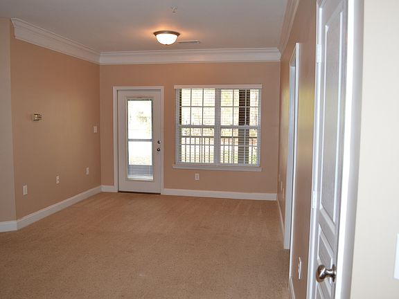 Den opens to back porch