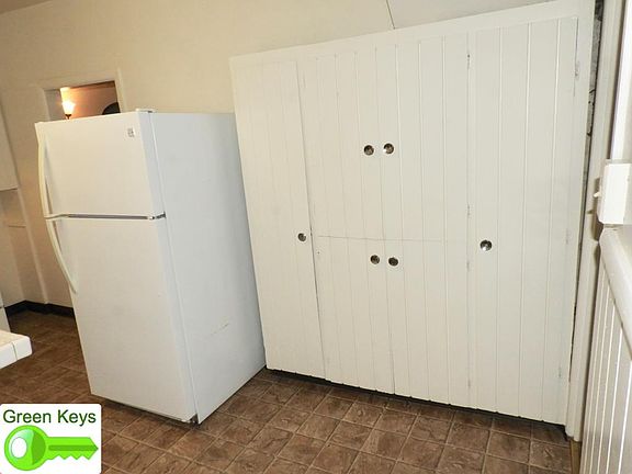 Kitchen - refrigerator and built-in pantry