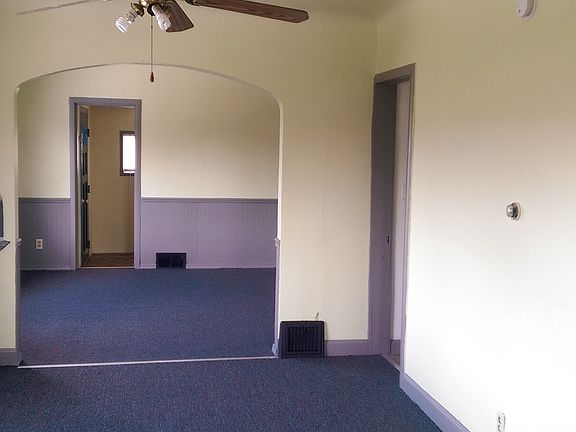 Dining room and doorway to laundry hookup.