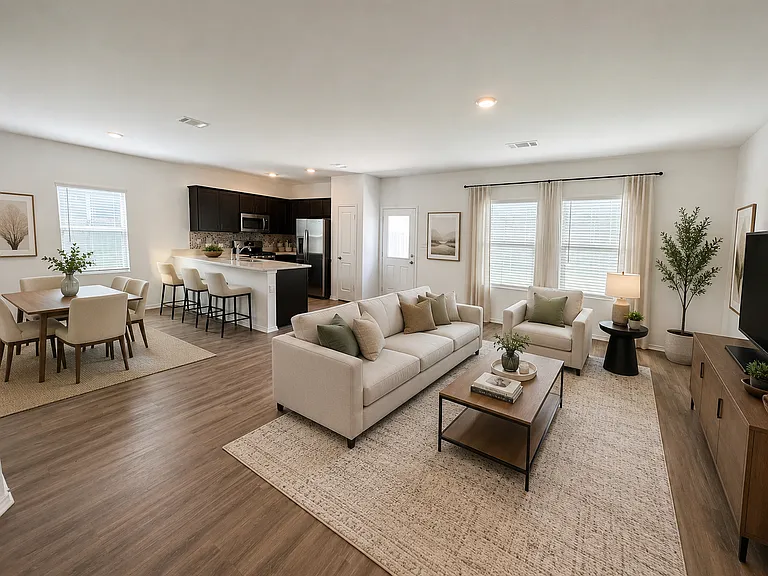 Living Room opens to kitchen/dining areas- virtually staged