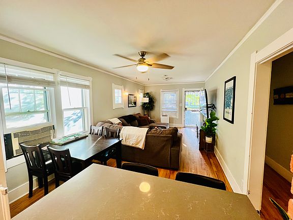 Nestled between the living room and kitchen is an ideal space for a dining table and chairs, creating a seamless flow for both casual meals and entertaining. 

This charming home features an abundance of windows, making it a plant lover's paradise :)