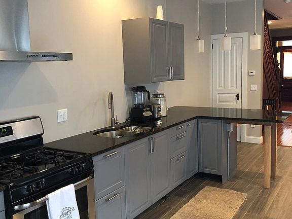 Kitchen: Another view: many cabinets