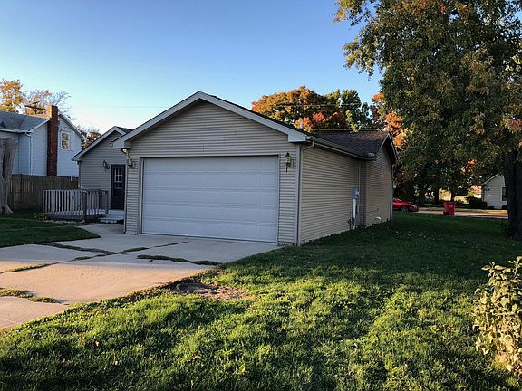 Back of house showing garage.