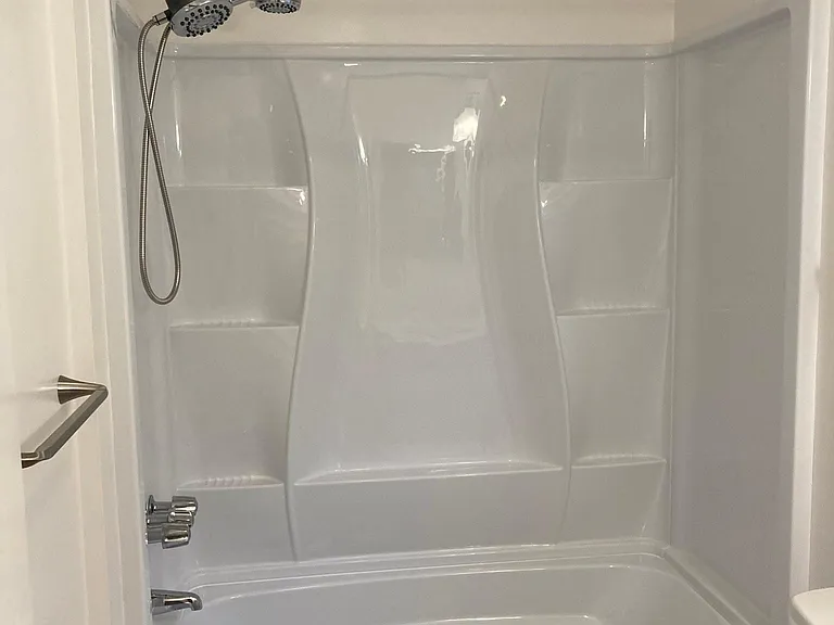 Shower over tub.