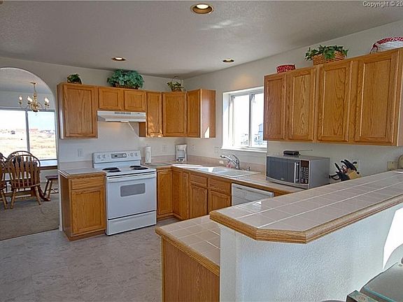 The kitchen is large and bright and has a nice breakfast bar.