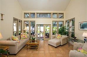 Living room, view to screened terrace