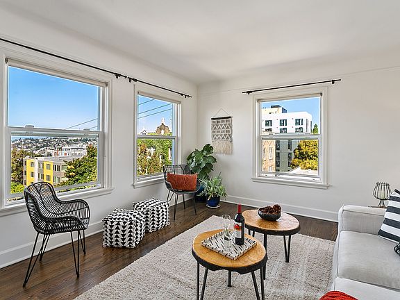 Enjoy the views! Large, oversized windows brings in the light and enhances the VIEWS!