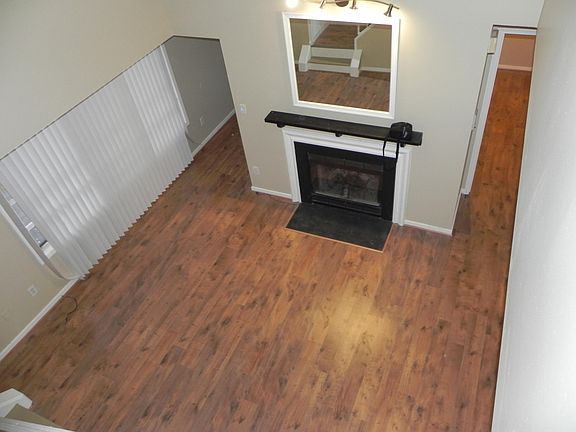 View from stairs to second bedroom of main living area. corridor on left leads to balcony
