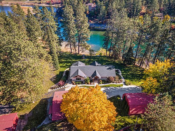 Aerial view of the property and river beyond
