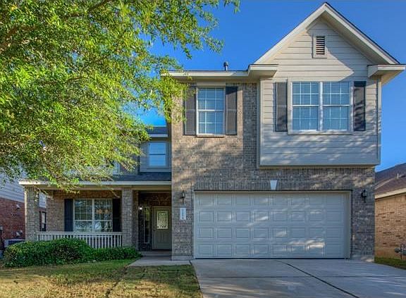 Beautiful entrance, just laid sod!  Beautiful trees in the front!  Lots of recent updates in side including light fixtures, sink fixtures and carpet and paint throughout!