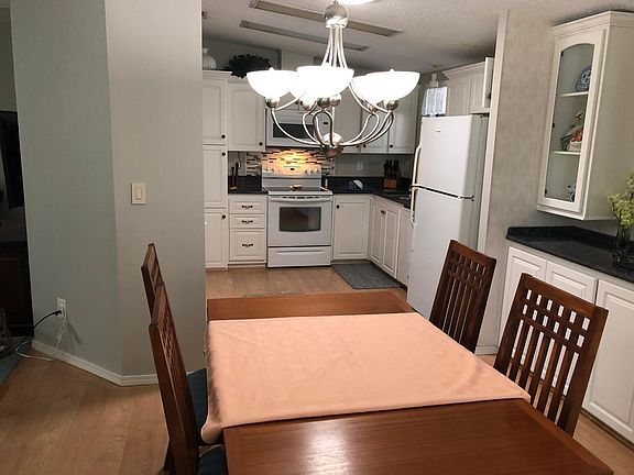 Dining area and kitchen stocked for all kinds of cooking