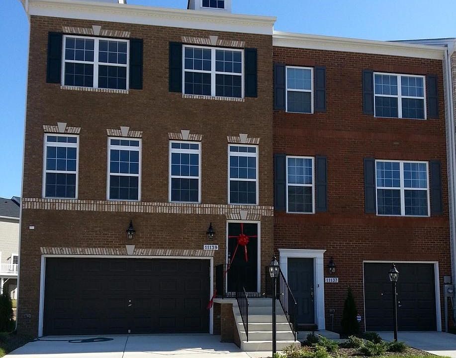 End Unit - 2 Car garage Brick Front