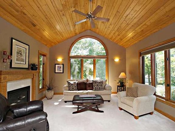 Panoramic great room to relax in with a vaulted tongue and groove pine ceiling.