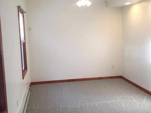 Bedroom - Has carpeting and newer ceiling fan.