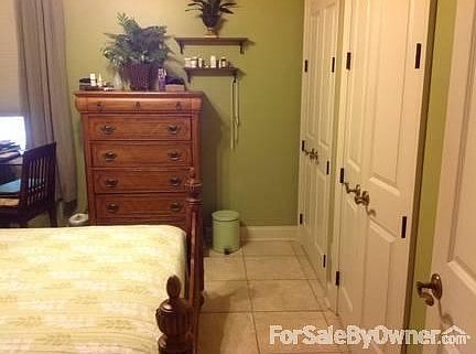 Two bi fold closets with shelves