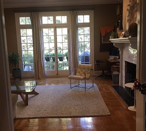LIGHT FILLED LIVING ROOM WITH 11' CEILING