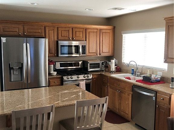 5th image of 5661 African Lilly Ct