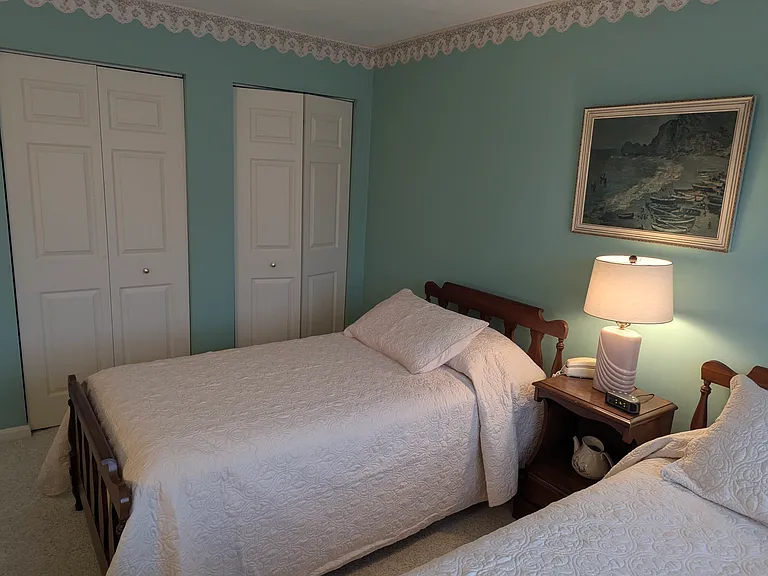 guest bedroom with double closet