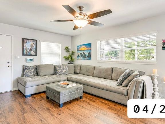 Living room, front door and dual paned windows throughout with lots of natural light