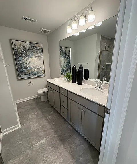 Dual vanity primary bathroom