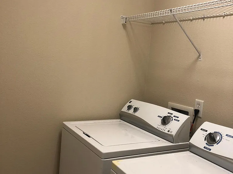 large separate laundry room conveniently upstairs with the bedrooms