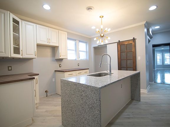 Ultra Luxury Kitchen (granite center waterfall island)