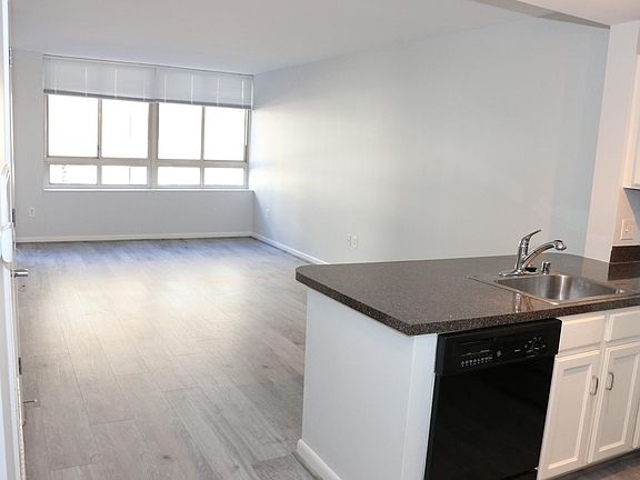 Open concept living space, with very spacious living room/kitchen.