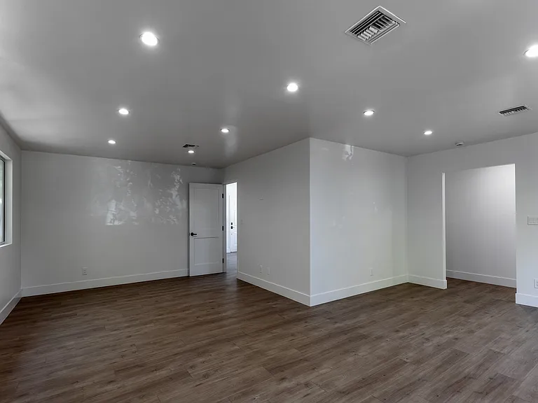 Living room viewing into dining room
