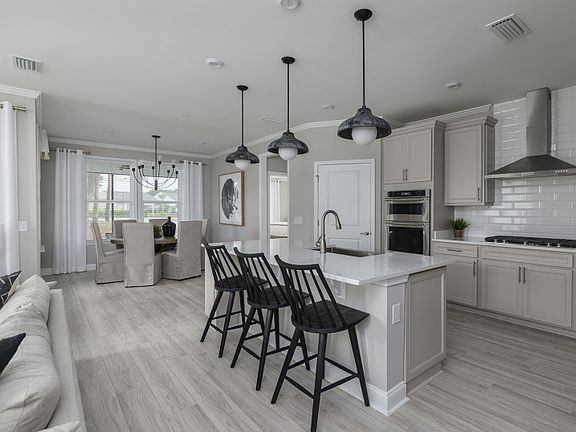 Large Kitchen that flows into the Dining Room area.