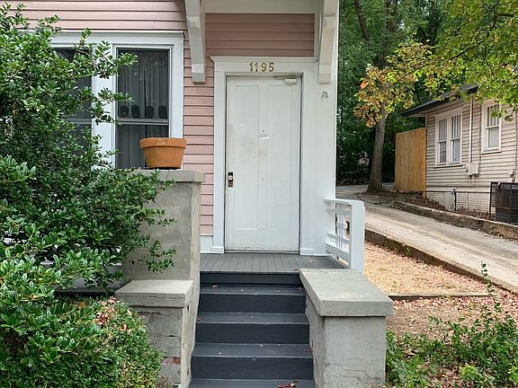 Front entrance and driveway to rear and off street parking with 3 light poles with good lightening provided.