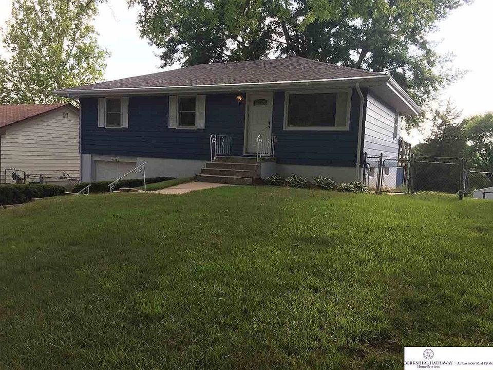 Newly painted exterior.  Shade tree covers most of front yard.