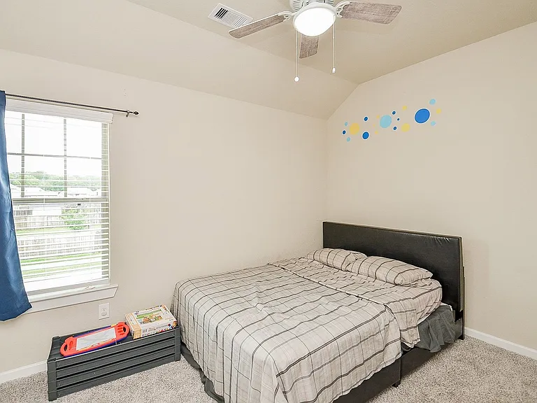 First bedroom upstairs. Standard full size. For context, this picture features a QUEEN size bed.
