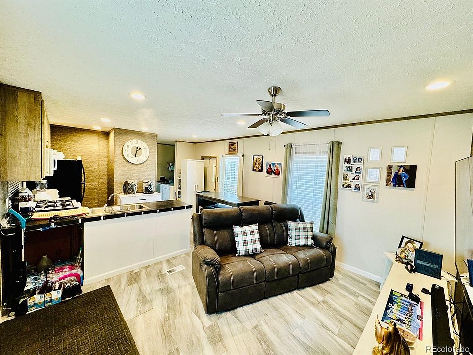 1st image of 5971 E 69th Ave #2