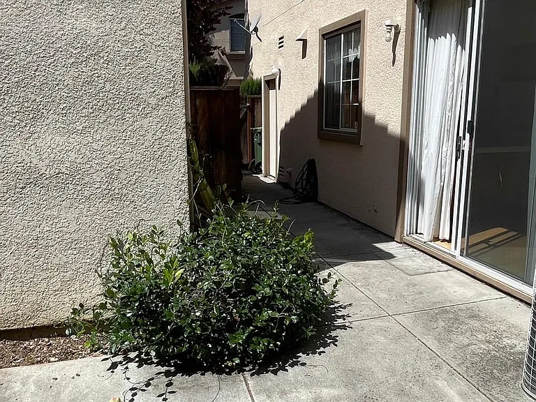 Easy maintained backyard to enjoy sunlight and privacy.