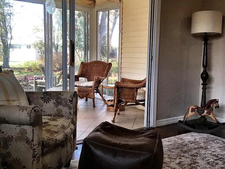 Screen in lanai with single pane windows for maximum air flow.