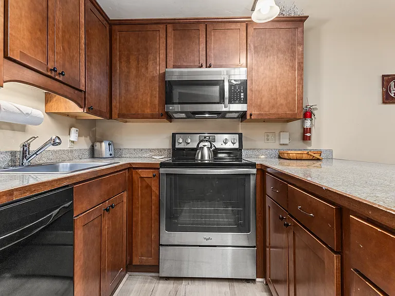 Kitchen | Refrigirator, Stove and Microwave