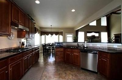 Large family friendly kitchen with breakfast bar