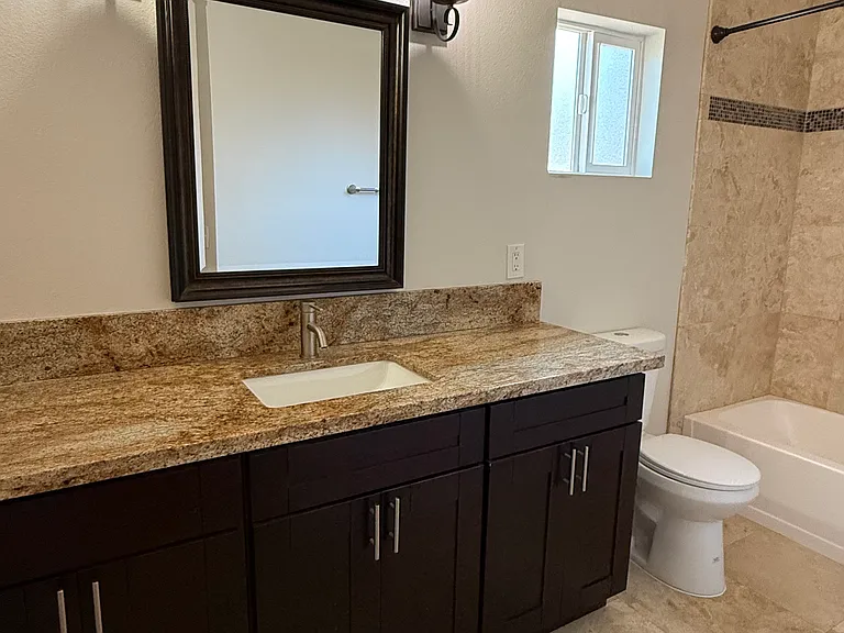 Bathroom upstairs with bathtub