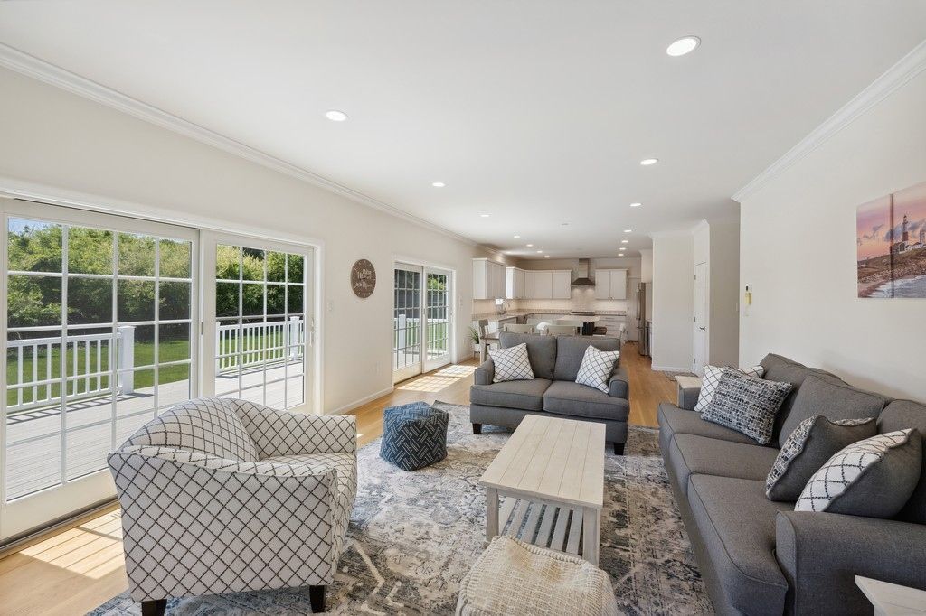 Open concept with sliders to outdoors