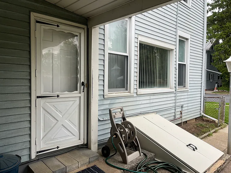 back door from patio with roof