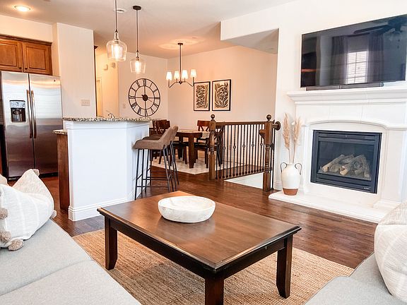 Open concept main level living, kitchen and dining