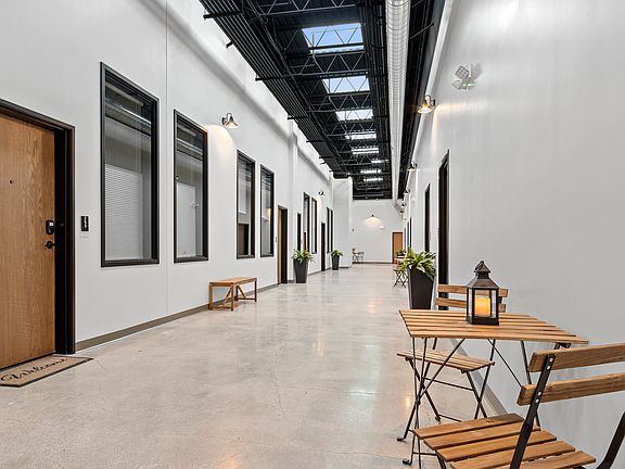 Our halls do more than connect- you can lounge, laugh, sip, and stay. Sunlight included.
